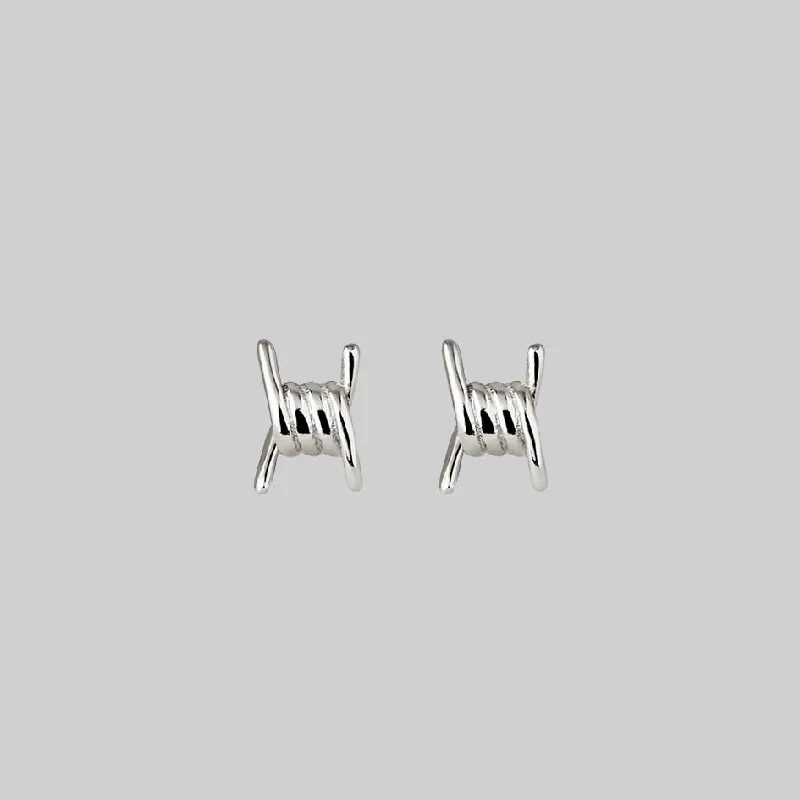 SURVIVAL. Symbolic Barbed Wire Stud Earrings - Silver